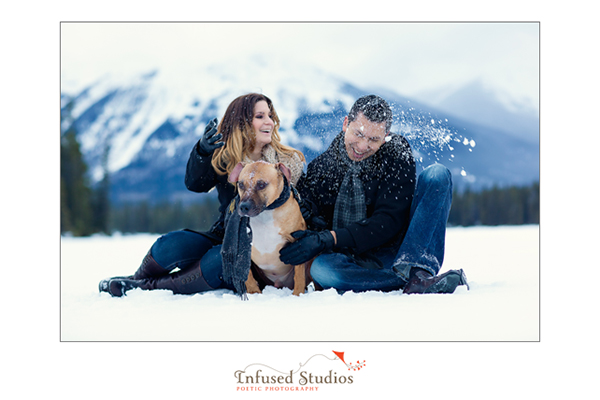 Outdoor winter engagement photo with dog